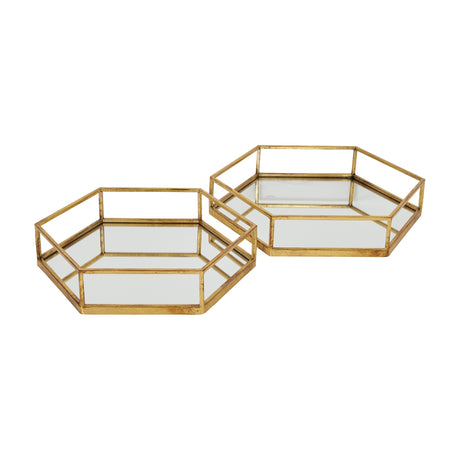 Hill Interiors Hexagon Glass Trays Set of Two in gold, featuring two mirrored hexagonal trays with raised gold metal frames on a white background.
