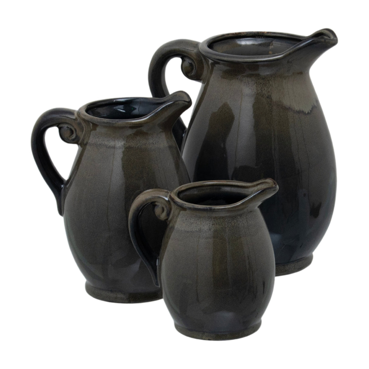 Hill Interiors 22cm green ceramic Olpe Vase, shown as three graduated glazed jug-form vases with curled handles and pouring spouts on a white background.