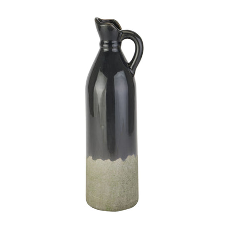 Hill Interiors tall stoneware jug with dark glazed upper body, curved handle, pouring lip and unglazed pale base, shown on a plain white background.