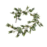 Hill Interiors LED winter garland with faux eucalyptus and lamb's ear foliage, warm white lights and battery pack, shown coiled on a white background.