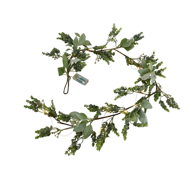 Hill Interiors LED winter garland with faux eucalyptus and lamb's ear foliage, warm white lights and battery pack, shown coiled on a white background.
