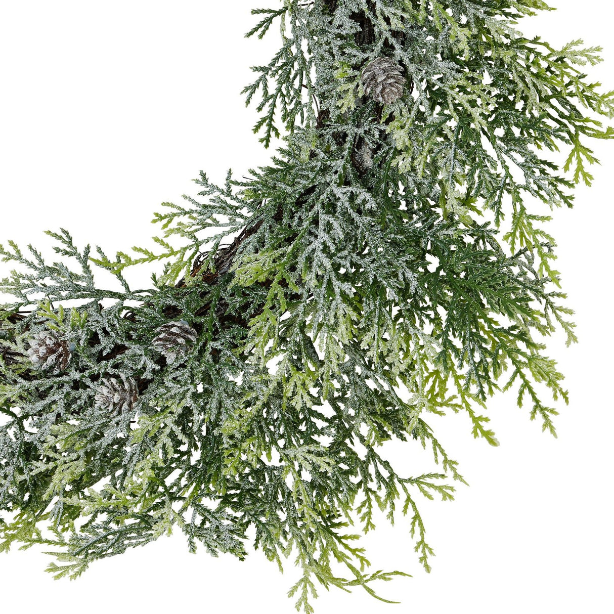 Close-up of Hill Interiors Frosted Pine Wreath with Pinecones in white, showing plastic pine foliage dusted with frost and small pinecones.