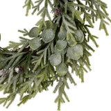 Close-up of Hill Interiors Frosted Pine and Eucalyptus Wreath 50cm in white, showing frosted pine sprigs, eucalyptus leaves and small pinecones.