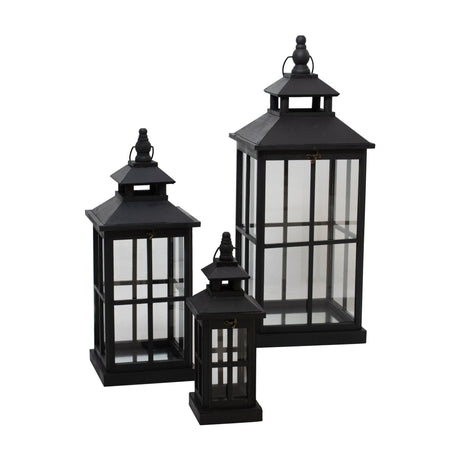 Hill Interiors set of three graduated black window-style lanterns with open tops and clear glass panels, arranged on a plain white background.