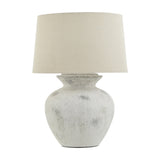 Hill Interiors 76cm ceramic table lamp with a rounded urn-shaped antique white glazed base and tapered neutral linen drum shade, on a plain background.