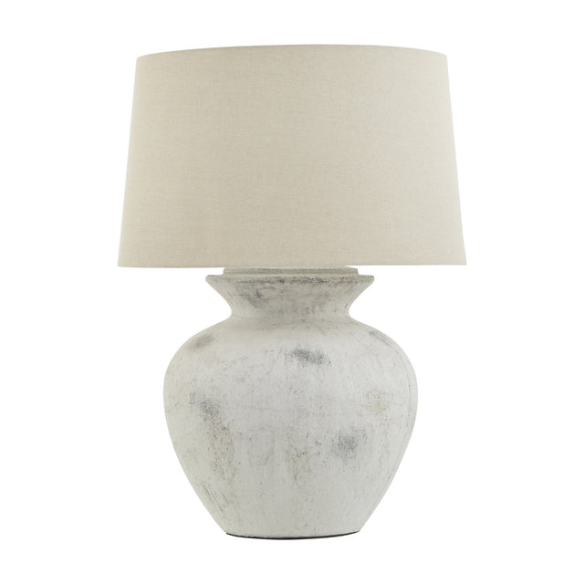 Hill Interiors 76cm ceramic table lamp with a rounded urn-shaped antique white glazed base and tapered neutral linen drum shade, on a plain background.