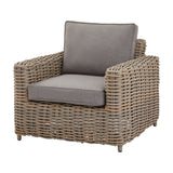 Hill Interiors beige woven rattan-effect garden lounge armchair with grey cushioned seat and back on a plain white background.