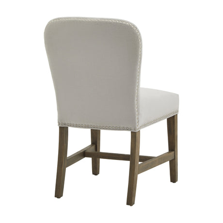 Hill Interiors Grey Wooden Dining Chair shown from the rear, with a tall upholstered back, nailhead trim and wooden legs on a white background.
