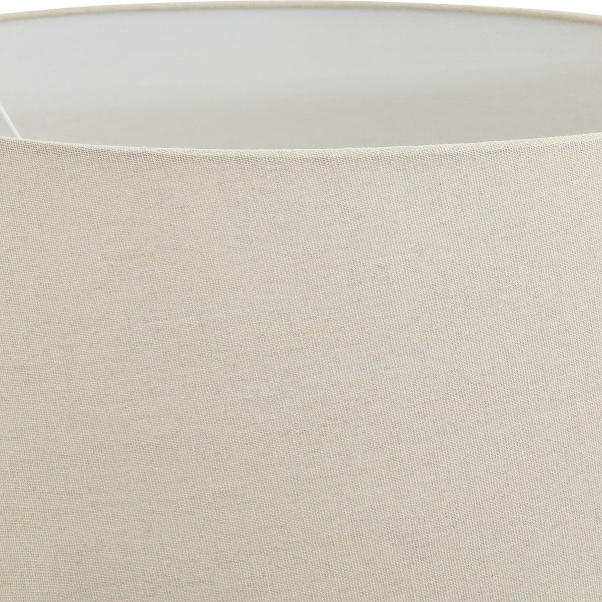 Close-up of the natural linen drum shade on the Hill Interiors Merenza Antique White Ceramic Table Lamp, showing the woven fabric texture.