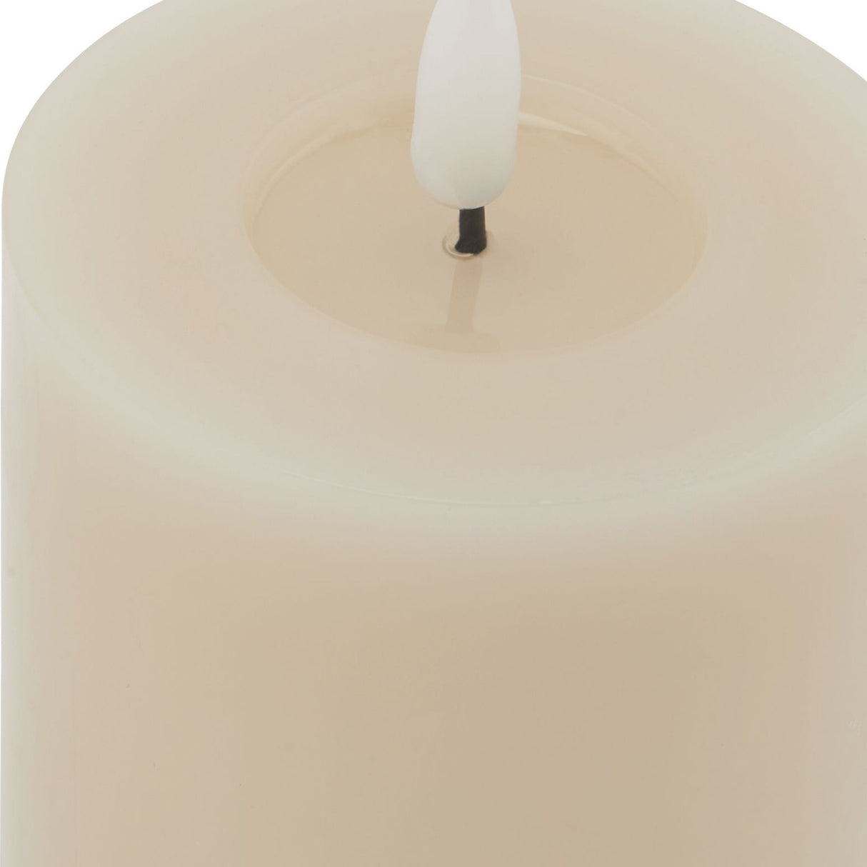 Close-up of the Hill Interiors Melt Effect LED Wax Candle in beige, showing the moulded pooled wax top and white flameless LED bulb wick.