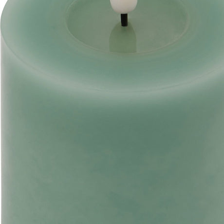 Close-up of Hill Interiors Melt Effect LED Wax Pillar Candle in sage green, showing the moulded drip-effect top edge and LED flame tip.