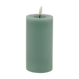 Hill Interiors Melt Effect LED wax pillar candle in sage green with a hollowed rim and flickering flame-shaped LED tip, shown on a white background.