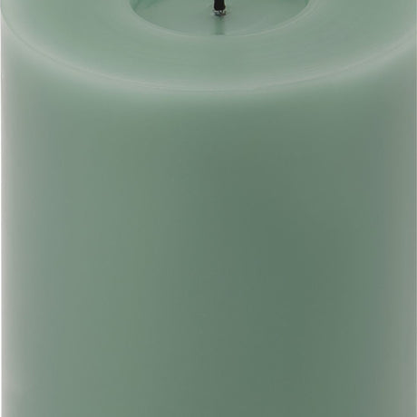 Close-up of the Hill Interiors Melt Effect LED Wax Pillar Candle in sage green, showing the pooled wax top finish and central LED wick.