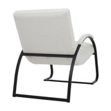 Hill Interiors Ribbed Ark Accent Chair in cream bouclé upholstery with a curved black metal frame, shown from the rear angle on a white background.