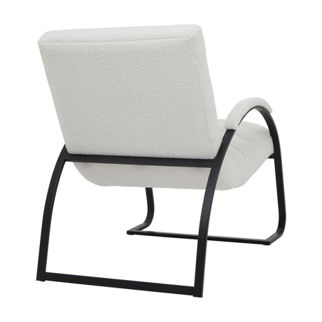 Hill Interiors Ribbed Ark Accent Chair in cream bouclé upholstery with a curved black metal frame, shown from the rear angle on a white background.