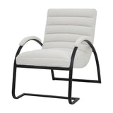 Hill Interiors Ribbed Ark accent chair in cream bouclé upholstery with ribbed seat and back, curved black metal frame and arms, on a white background.