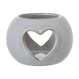 Hill Interiors white ceramic heart cut-out round tealight holder with glazed finish, shown on a plain white background.