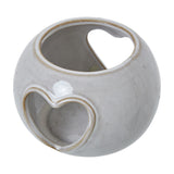 Hill Interiors white glazed ceramic round tealight holder with heart-shaped cut-outs and open top recess, shown on a plain white background.