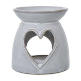 Hill Interiors white glazed ceramic tealight and wax melt holder with heart cut-out design, shown on a plain white background.