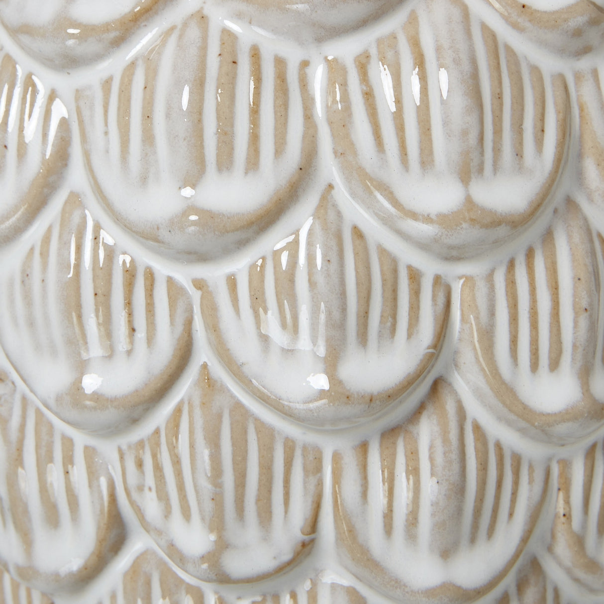 Close-up of the Hill Interiors Large Ceramic Pine Cone Trinket Dish showing glossy white glazed overlapping scales over a warm beige ceramic body.