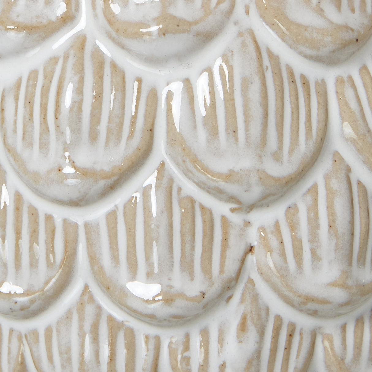 Close-up of Hill Interiors Medium Ceramic Pine Cone Trinket Dish showing overlapping scaled ridges in a glossy white glaze over a warm beige base.
