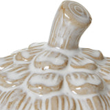 Close-up of the Hill Interiors Medium Ceramic Pine Cone Trinket Dish lid, showing the stem finial and overlapping scale detail in white glaze over beige.