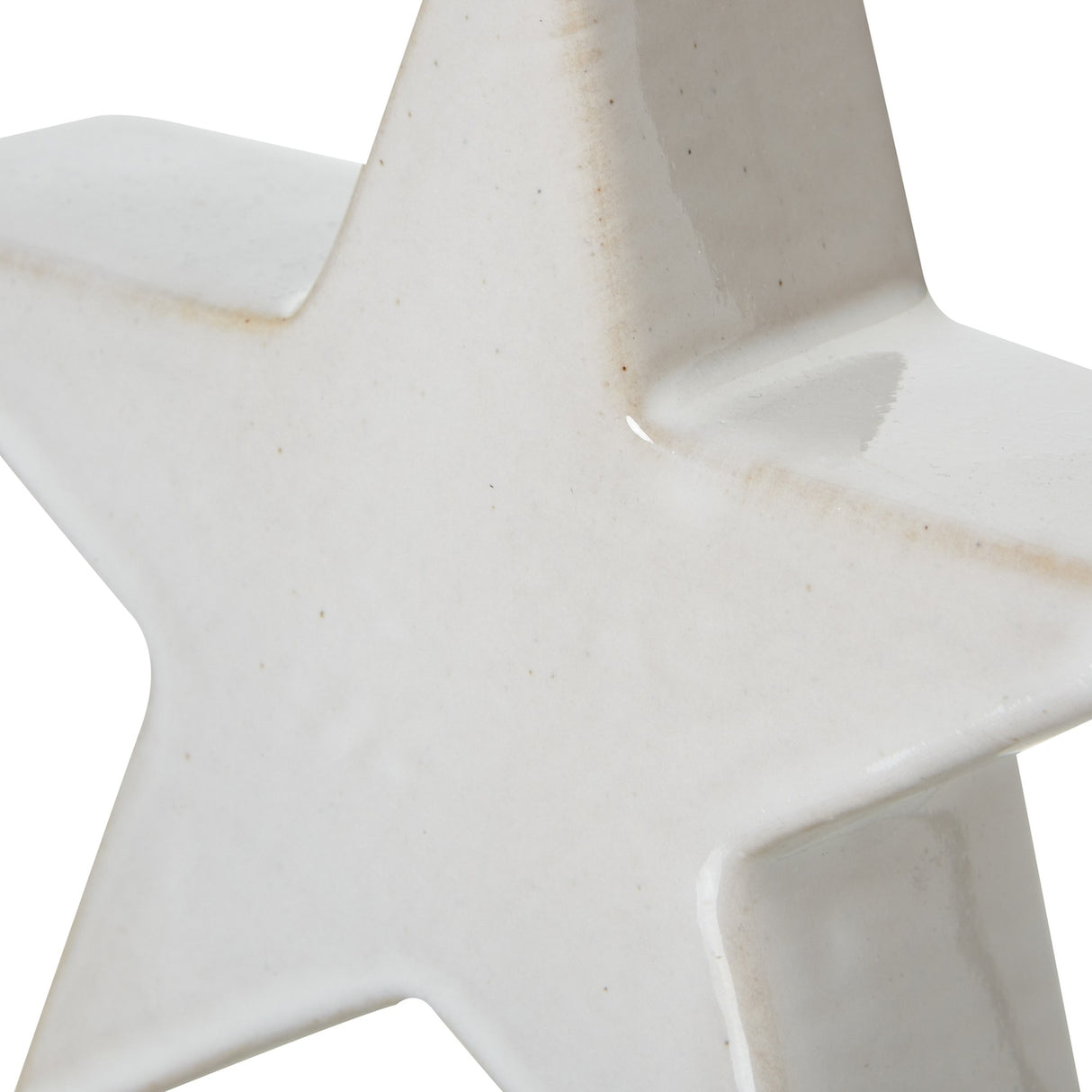 Close-up of the Hill Interiors Small Ceramic Standing Star Decoration in white, showing the smooth glazed finish and five-point shape.