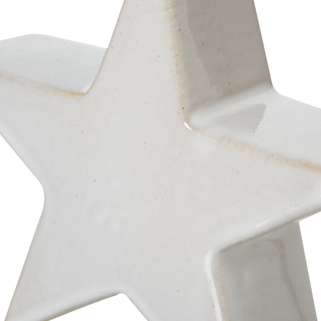 Close-up of the Hill Interiors Small Ceramic Standing Star Decoration in white, showing the smooth glazed finish and five-point shape.