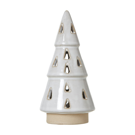 Hill Interiors small white ceramic Christmas tree with tiered fir shape, triangular cut-out openings, built-in LED and natural base, on a white background.