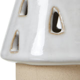 Close-up of Hill Interiors Small White Ceramic Cut-Out Tree with teardrop openings and glossy white glaze over an unglazed base.