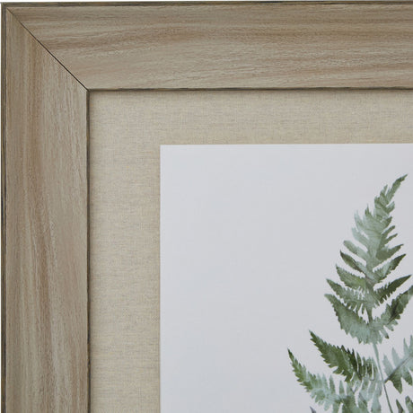 Close-up of the Hill Interiors Bracken Fern Print corner, showing the washed wood frame, linen-look mount, and green fern detail on white.