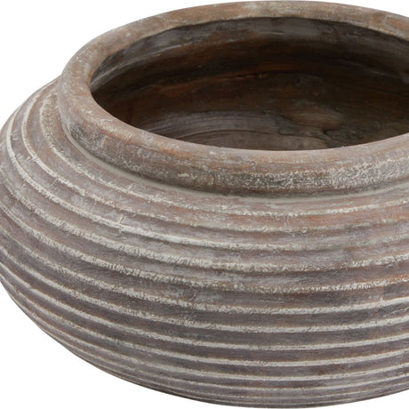 Hill Interiors Round Ribbed Ceramic Planter in brown, shown close-up with a wide rounded body, vertical ribbing and a weathered earthy finish.