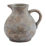 Hill Interiors Ceramic Jug in brown with a rounded body, shaped pouring lip, curved handle and weathered glaze finish, shown on a plain white background.
