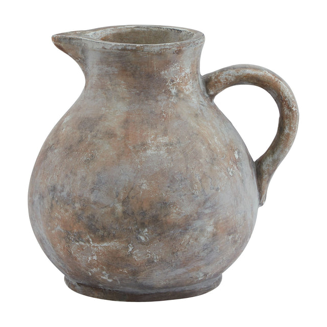 Hill Interiors Ceramic Jug in brown with a rounded body, shaped pouring lip, curved handle and weathered glaze finish, shown on a plain white background.