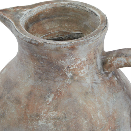 Close-up of the Hill Interiors Ceramic Jug in brown, showing the shaped pouring lip, rounded rim and sturdy handle with a weathered earthy glaze.
