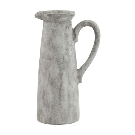 Hill Interiors Tall Ceramic Jug in white with a distressed glaze, slender tapered body, shaped pouring lip and looped handle, on a plain background.