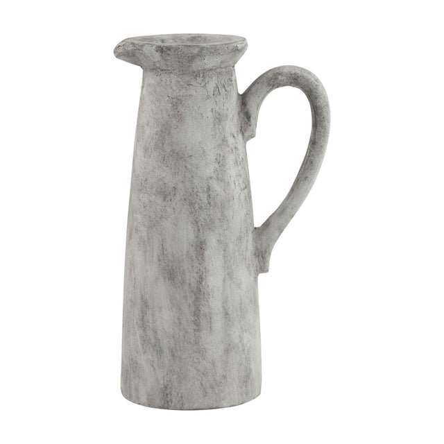 Hill Interiors Tall Ceramic Jug in white with a distressed glaze, slender tapered body, shaped pouring lip and looped handle, on a plain background.