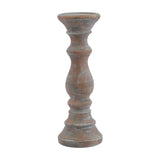 Hill Interiors Column Candle Holder in brown ceramic, a tapered pillar with turned detailing and a recessed top for a taper candle, on a plain background.
