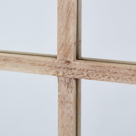 Close-up of the Hill Interiors Large Washed Wood Window Mirror in brown, showing the wooden frame's crossed glazing bars and grain on a pale background.