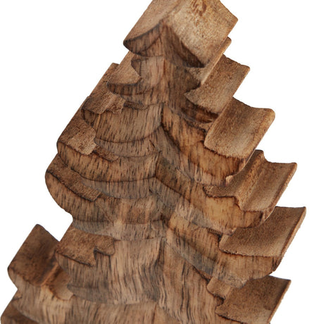 Close-up of Hill Interiors Natural Wooden Christmas Tree in beige, showing the carved tiered branches and visible wood grain against a white background.