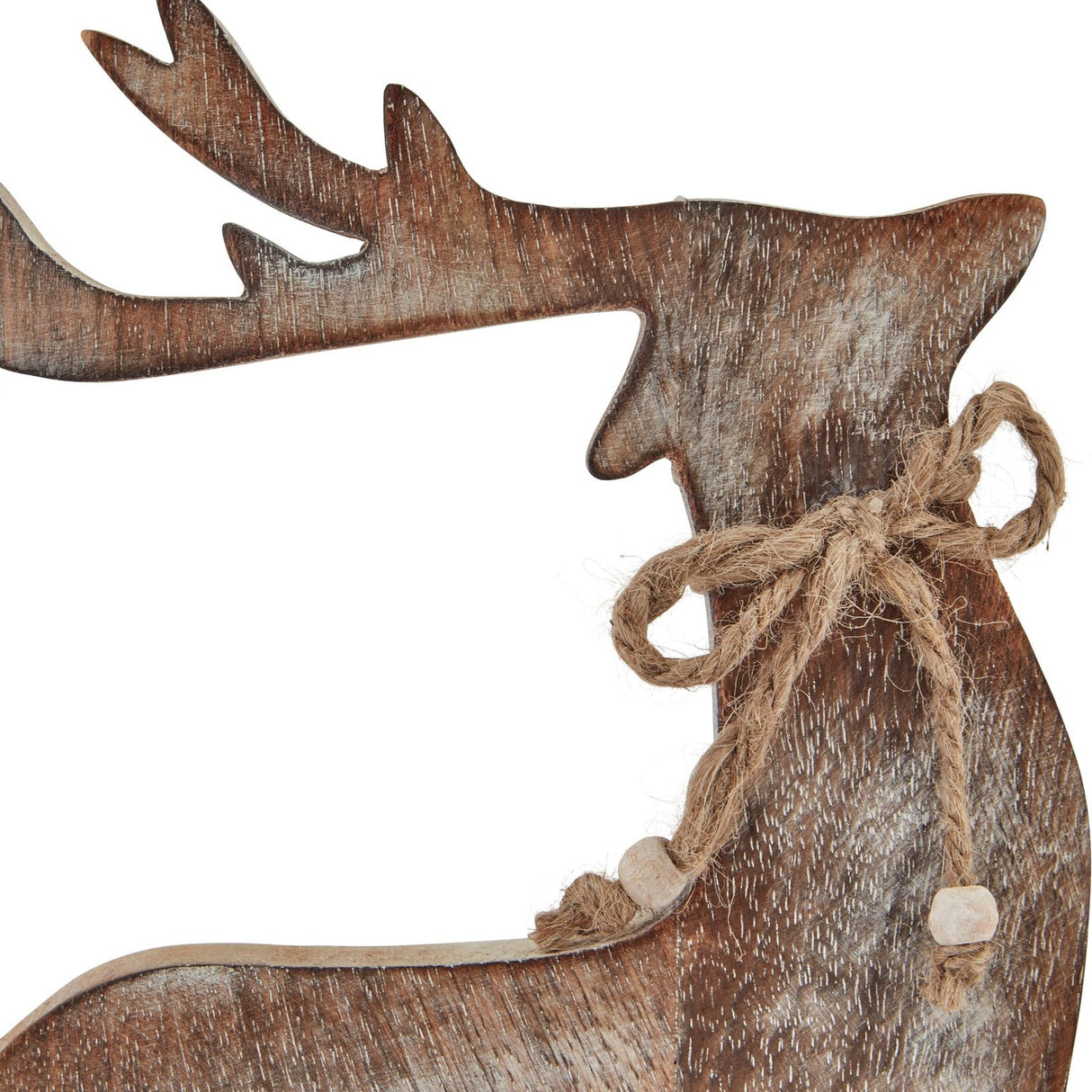 Close-up of Hill Interiors White Wash Wooden Reindeer Decoration in brown, showing carved antlers, head and jute bow with wooden beads around the neck.