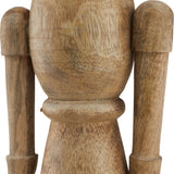 Close-up of Hill Interiors Wooden Nutcracker Decoration in beige, showing the carved solid wood body and arms with visible natural grain.
