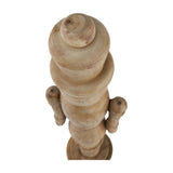 Close-up top view of Hill Interiors Wooden Nutcracker Decoration in beige, showing the turned wood head, hat and arms against a white background.