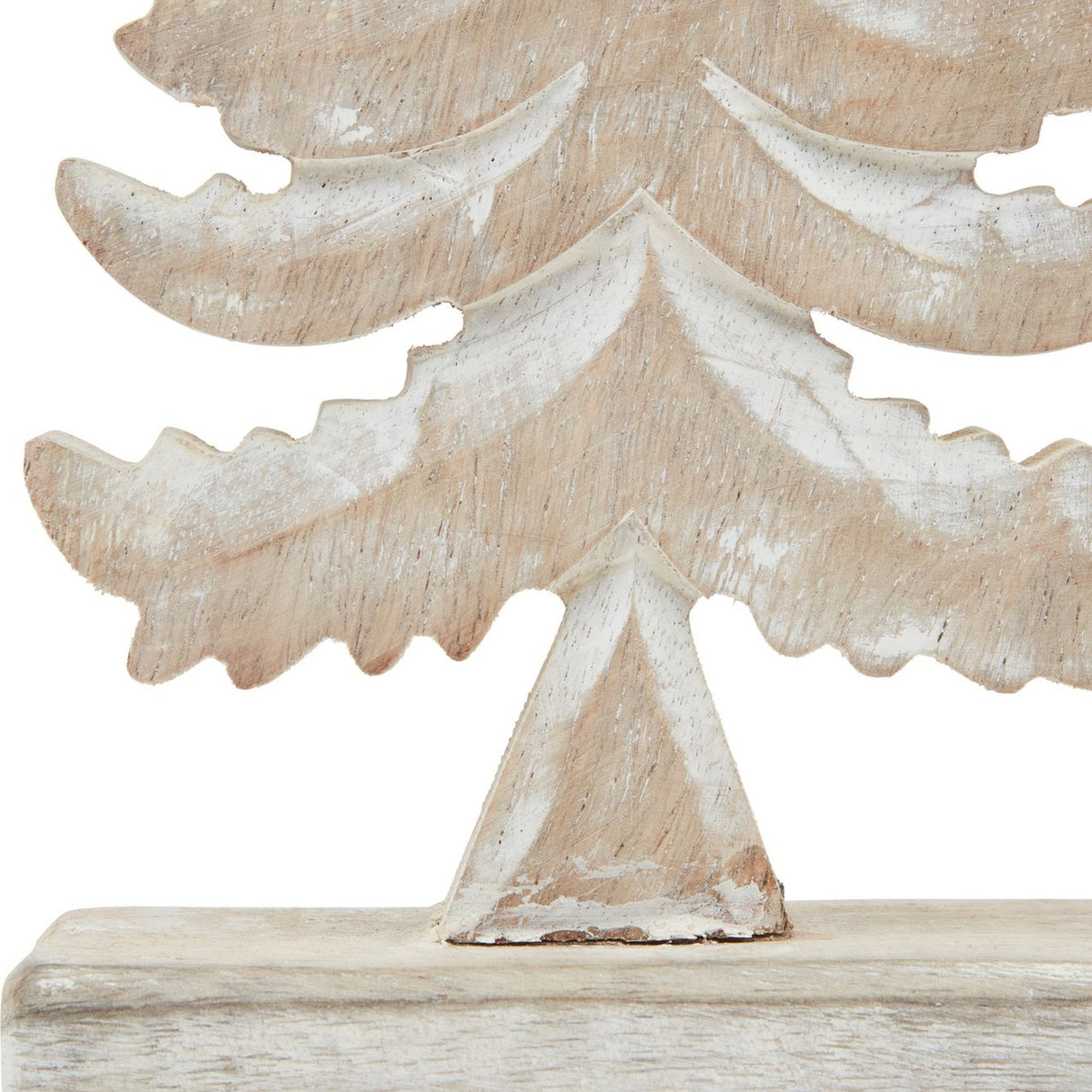 Close-up of Hill Interiors wooden tiered tree decoration showing carved fir tiers, white wash finish over warm brown grain, and freestanding base.