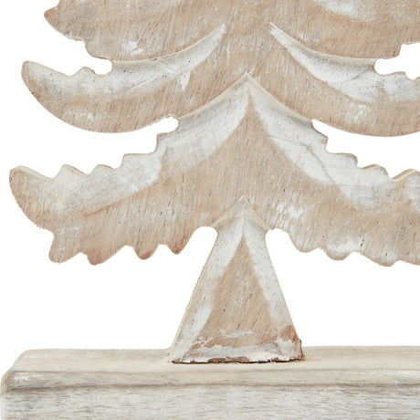 Close-up of Hill Interiors wooden tiered tree decoration showing carved fir tiers, white wash finish over warm brown grain, and freestanding base.