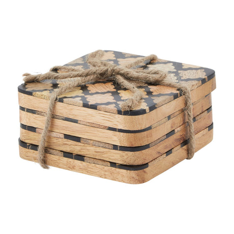 Hill Interiors set of four square wood coasters stacked and tied with jute string, showing black geometric pattern over natural wood grain finish.