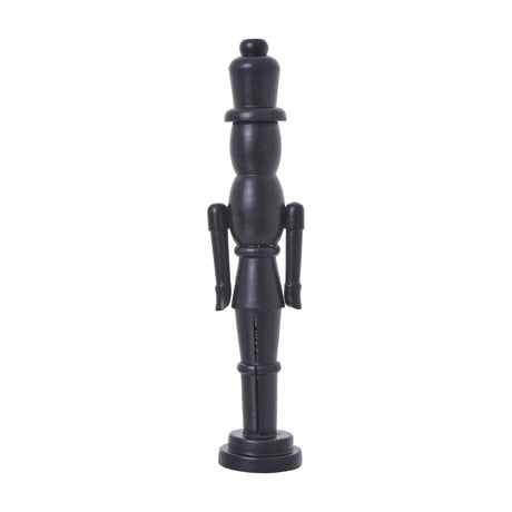 Hill Interiors Minimalist Wooden Nutcracker Decoration in matte black, a tall 50cm soldier figure with clean lines on a round base, shown on white.