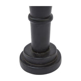 Close-up of the stepped cylindrical black wooden base of the Hill Interiors Minimalist Wooden Nutcracker Decoration, shown against a plain white background.