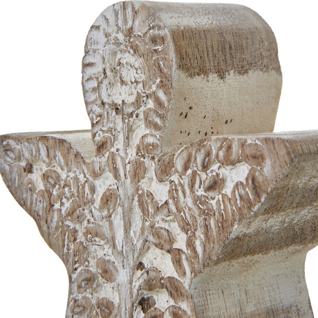 Close-up of Hill Interiors Patterned Angel Wooden Decoration in brown, showing carved textured detailing across the wings and body with a white wash finish.