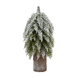 Hill Interiors Small Snowy Fir Tree on Tall Wood Log in brown, a 30cm plastic Christmas decoration with frosted evergreen branches, shown on a white background.